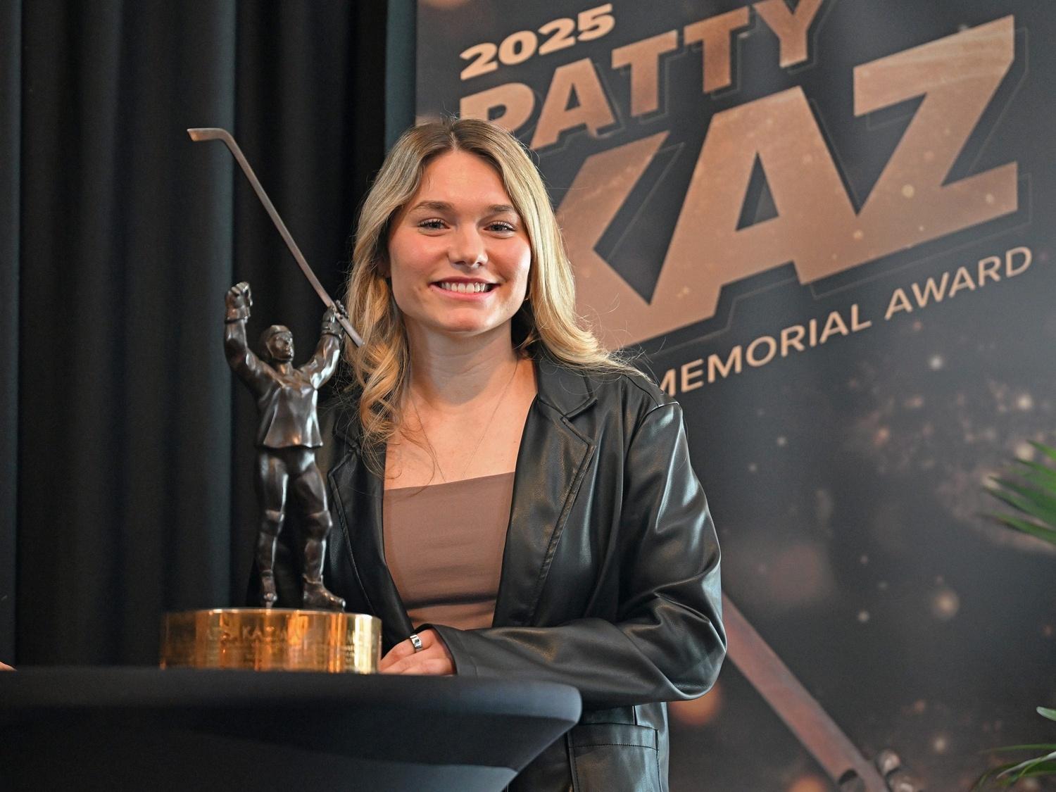 Wisconsin's Casey O'Brien with the trophy after winning the 2025 Patty Kazmaier Memorial Award